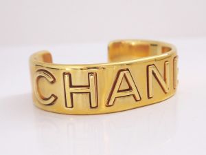 Chanel Letter Logo Bangle Cuff Bracelet.jpg